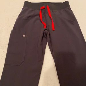 Figs XXS with cargo pocket. Gray in color with red draw string. NWOT.